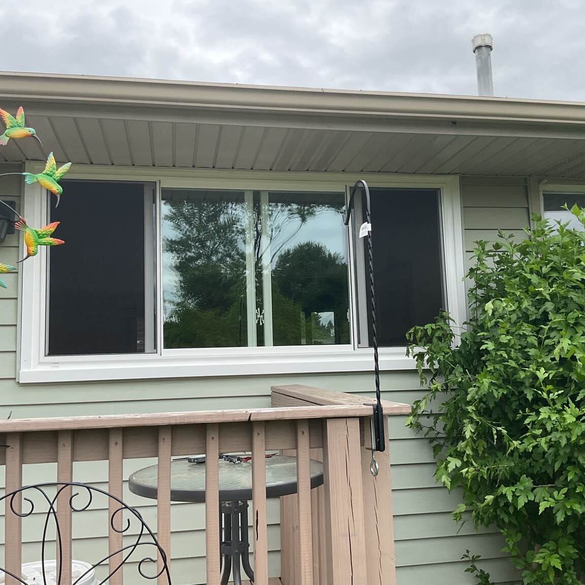 New York Sash's expert installation of sleek sliding windows on the exterior of a Syracuse, NY, residence, enhancing its curb appeal and architectural lines.