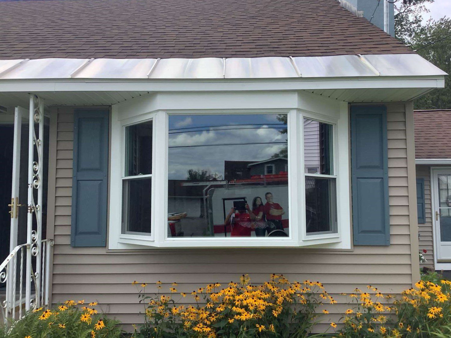 Bay window with double hung windows.