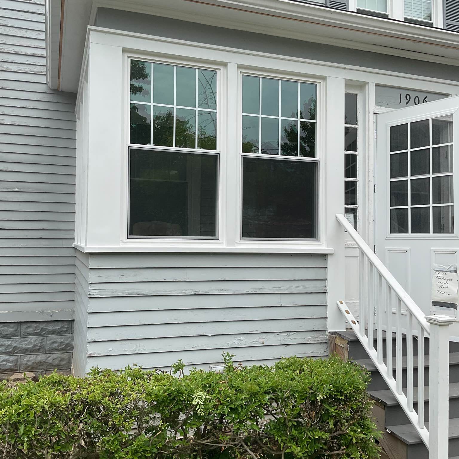 Brand new energy-efficient vinyl windows installed by New York Sash on a home in Utica, New York.