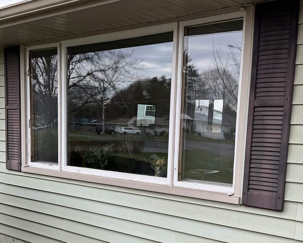 Old Window Before Exterior look of an old wooden window, about to be replaced by a custom-made replacement vinyl window from New York Sash.