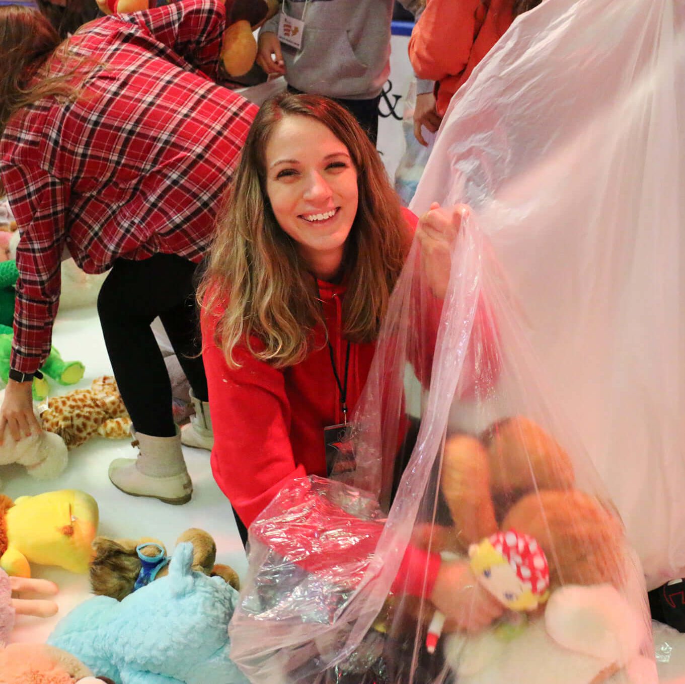 Katie Reilly of New York Sash bags bears at Teddy Bear Toss - MAIAH DIGIRONIMO