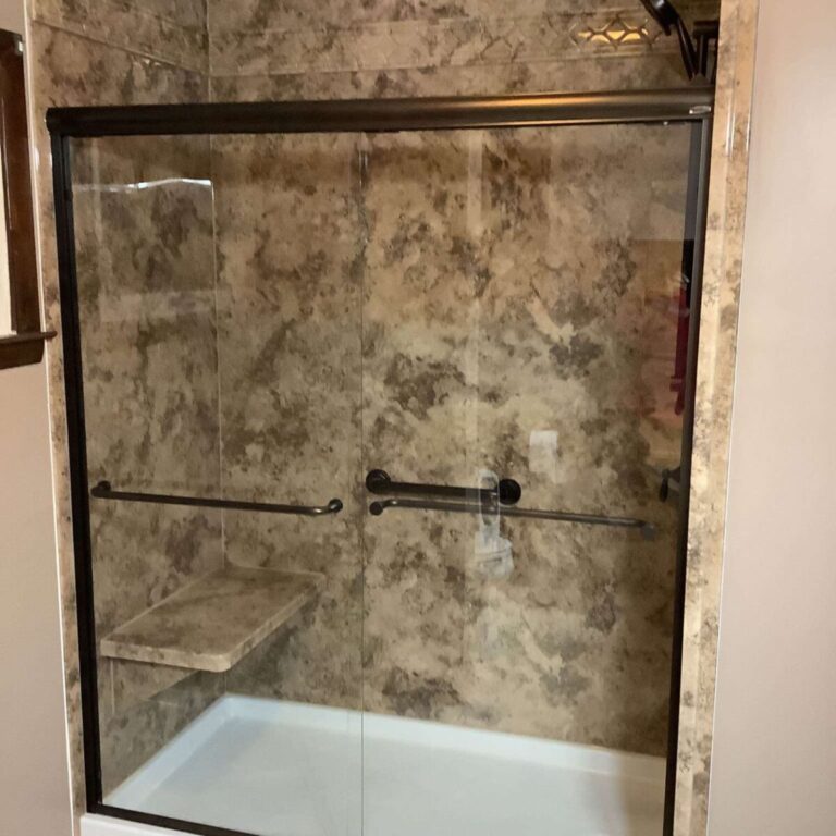Completed shower conversion with oil rubbed bronze fixtures