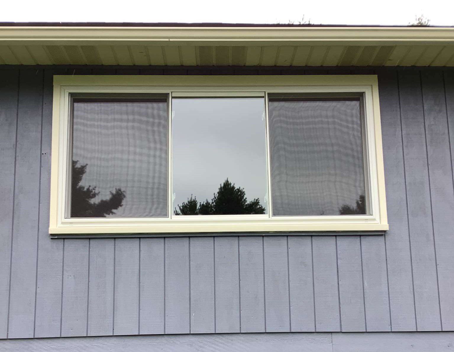 Three lite slider window finished in white